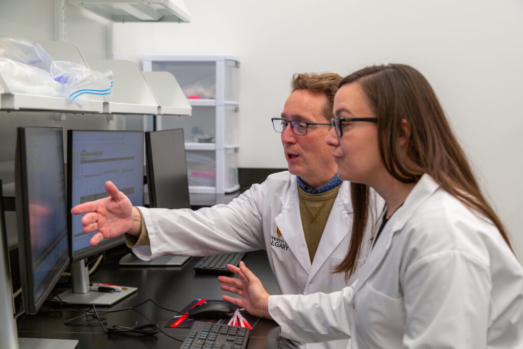 Dr. Kerri Miller (Front) and Dr. Mike Wieser (Back) in the Cancer Metallomics Laboratory (Photo Credit: Glynnis Mutch, University of Calgary)