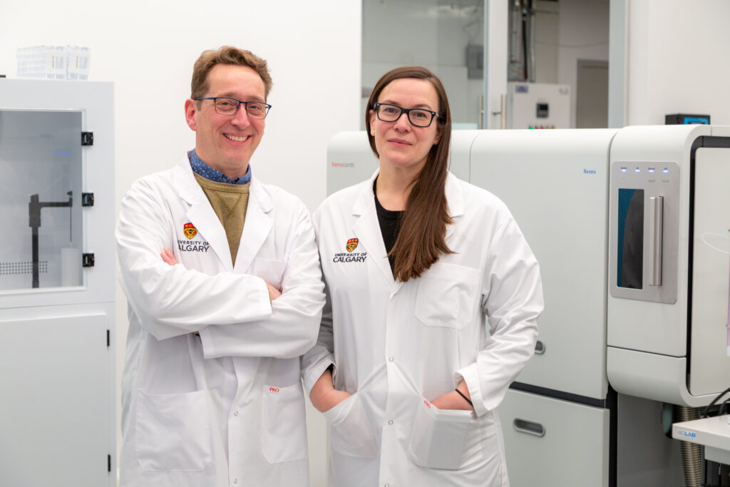 Dr. Mike Wieser (Left) and Dr. Kerri Miller (Right) in the Cancer Metallomics Laboratory (Photo Credit: Glynnis Mutch, University of Calgary)