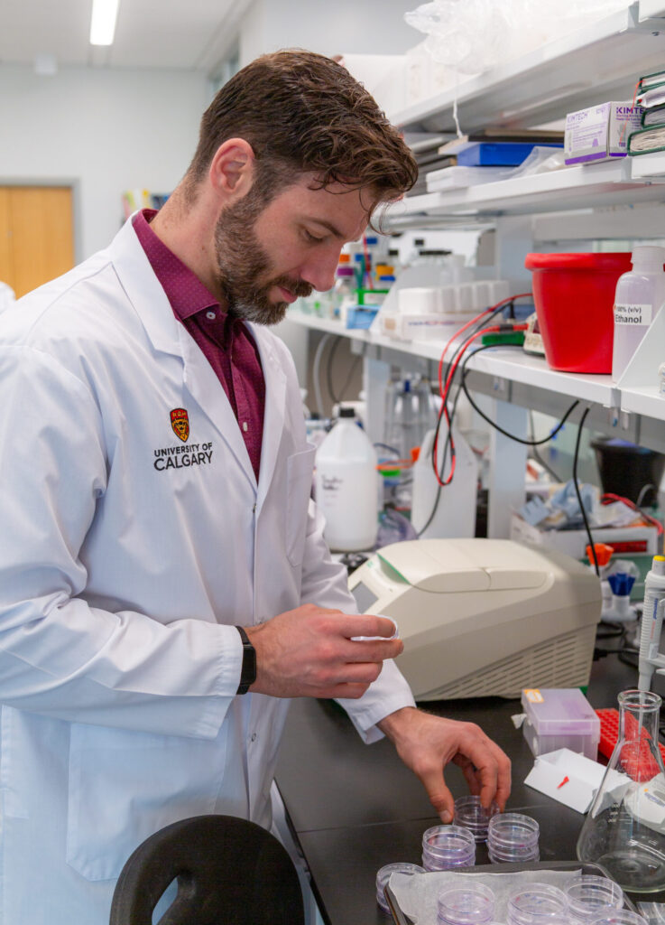 Dr. Dustin Pearson in the Transdisciplinary Cancer Research Hub (Photo Credit: Glynnis Mutch, University of Calgary)