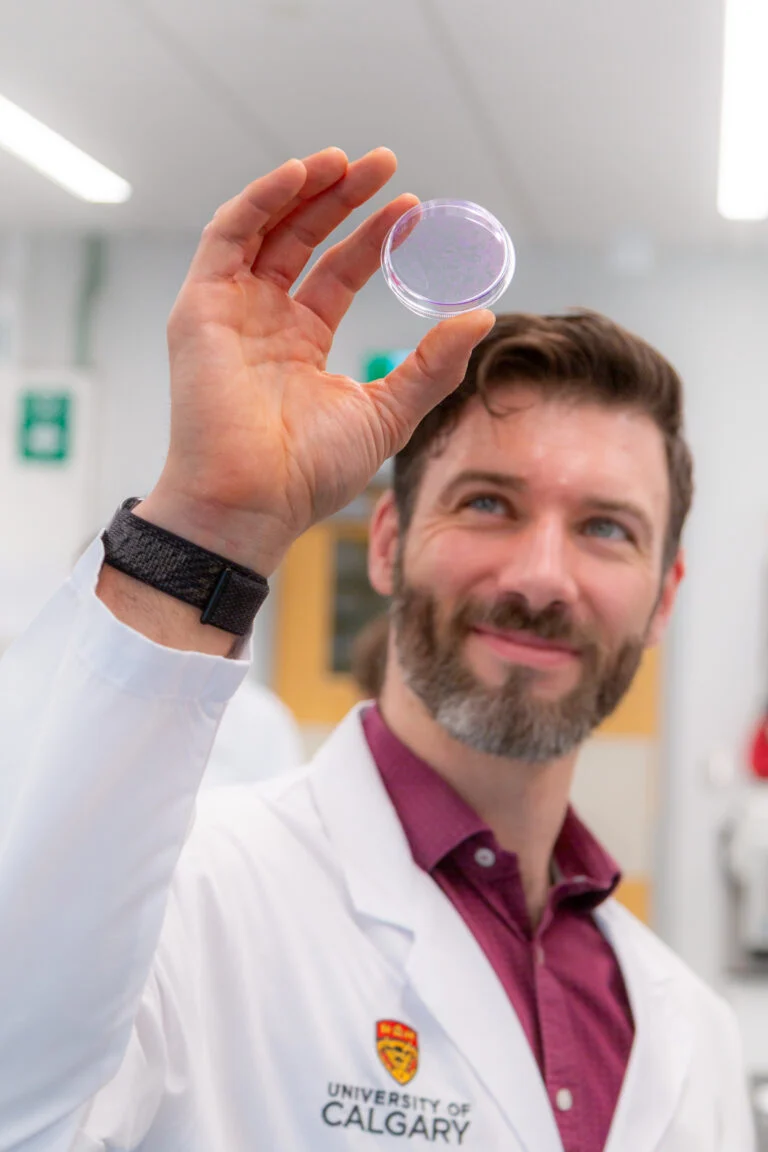Dr. Dustin Pearson in the Transdisciplinary Cancer Research Hub (Photo Credit: Glynnis Mutch, University of Calgary)